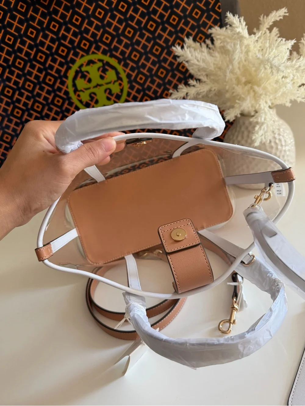 Tory Burch height 19